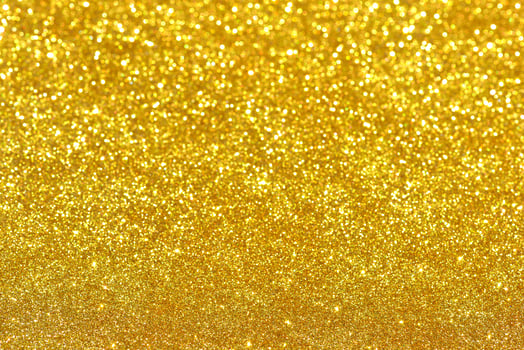 Golden glitter bokeh lighting texture Blurred abstract background for birthday, anniversary, wedding, new year eve or Christmas photo