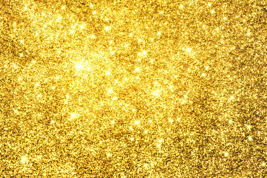 Golden glitter bokeh lighting texture Blurred abstract background for birthday, anniversary, wedding, new year eve or Christmas photo