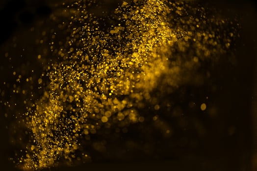 Golden glitter bokeh lighting texture Blurred abstract background for birthday, anniversary, wedding, new year eve or Christmas photo
