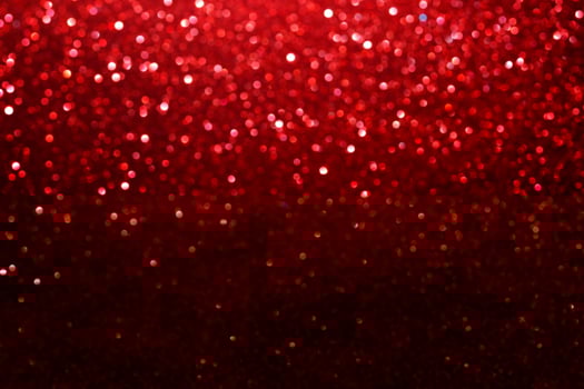 red glitter bokeh lights Blurred abstract background for Valentines, birthday, anniversary, wedding, new year and Christmas photo