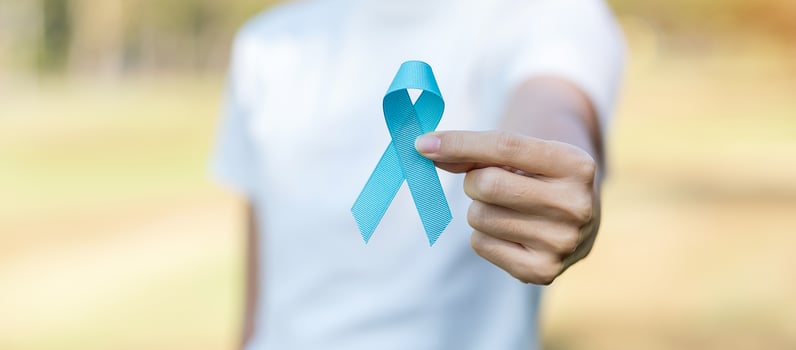 November Prostate Cancer Awareness month, woman holding Blue Ribbon for supporting people living and illness. Healthcare, International men, Father, World cancer day and world diabetes day concept photo