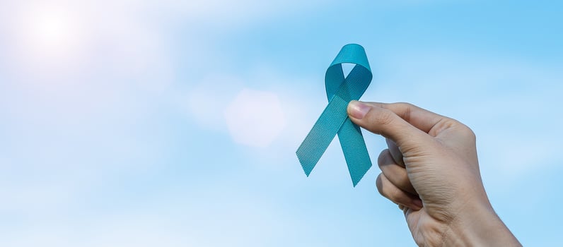 November Prostate Cancer Awareness month, man holding light Blue Ribbon for supporting people living and illness. Healthcare, International men, Father, World cancer day and world diabetes day concept photo