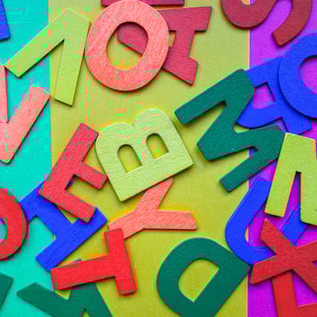 colored wooden letters background photo