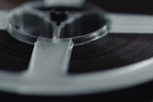 old film reel in black and white photo