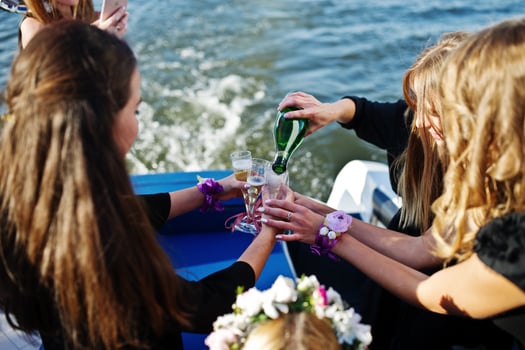 Girls having fun at yacht on hen party. photo
