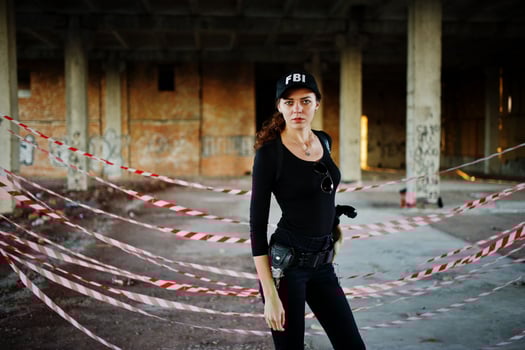Sexy FBI female agent at abadoned place. photo
