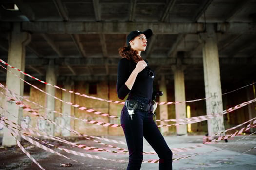 Sexy FBI female agent at abadoned place. photo