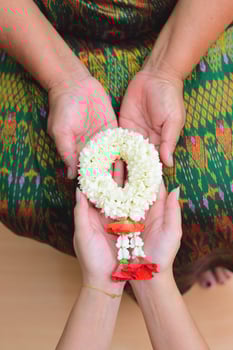 Give Thai traditional jasmine garland to mother, Thai traditional jasmine garland. symbol of Mother's day in thailand photo