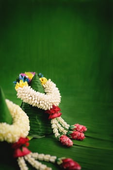 Thai traditional jasmine garland.symbol of Mother's day in thailand on Banana leaf photo