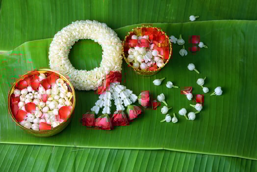 Thai traditional jasmine garland.symbol of Mother's day in thailand on Banana leaf photo