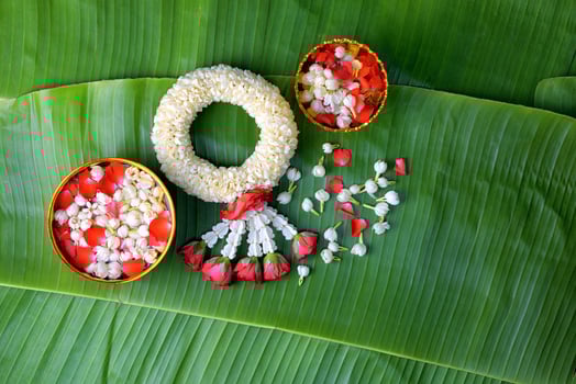 Thai traditional jasmine garland.symbol of Mother's day in thailand on Banana leaf photo