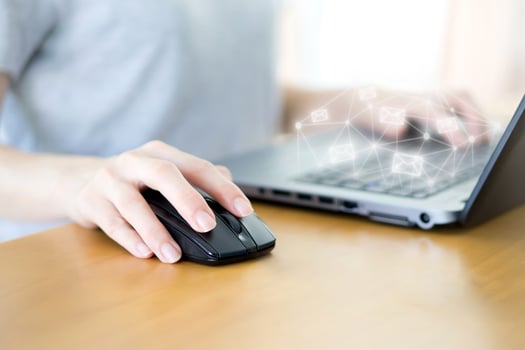 Woman using Laptop with email icon photo
