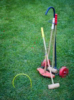 Croquet equipment on lawn photo
