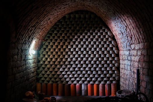 Inside the kiln pottery arranged in an orderly fashion photo
