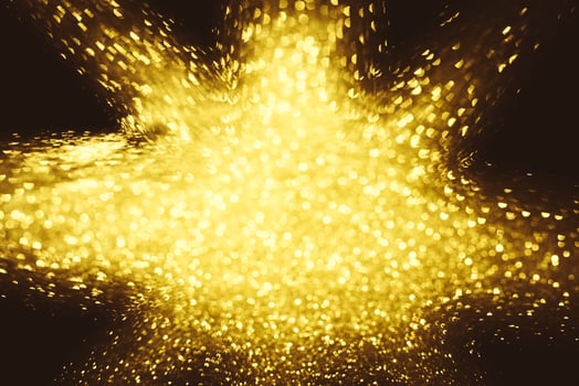 Golden glitter bokeh lighting texture Blurred abstract background for birthday, anniversary, wedding, new year eve or Christmas photo