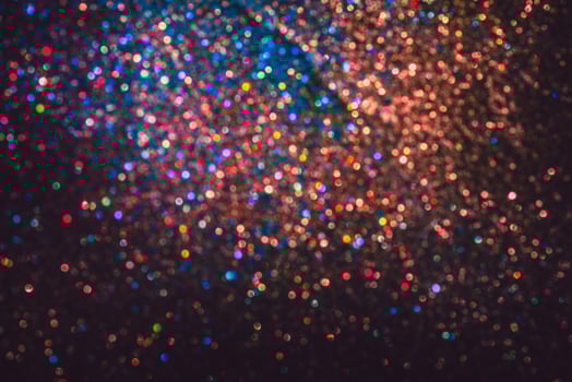 bokeh effect glitter colorful blurred abstract background for birthday, anniversary, wedding, new year eve or Christmas photo