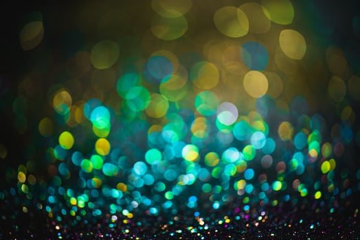 bokeh effect glitter colorful blurred abstract background for birthday, anniversary, wedding, new year eve or Christmas photo