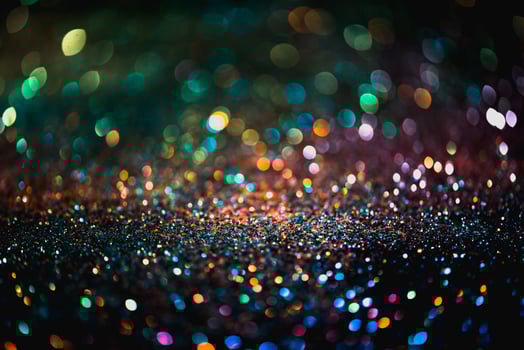bokeh effect glitter colorful blurred abstract background for birthday, anniversary, wedding, new year eve or Christmas photo