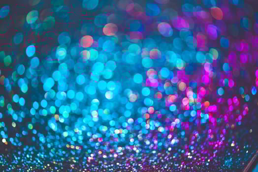 bokeh effect glitter colorful blurred abstract background for birthday, anniversary, wedding, new year eve or Christmas photo