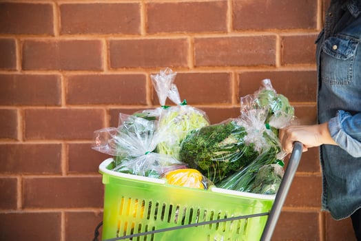 Lady is shopping fresh vegetable in supermarket store - woman in fresh market lifestyle concept photo