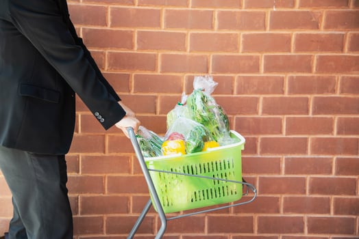Man is shopping fresh vegetable in supermarket store - man in fresh market lifestyle concept photo
