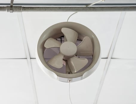 White plastic ventilation above the door. photo
