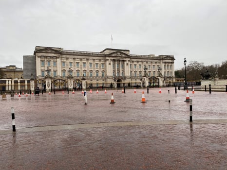 A view of Buckingham Palace in London in July 2023 on a wet day photo