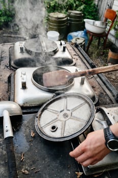 Cooking in the field kitchen during the war in Ukraine, conditions during the war. photo