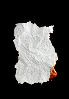 burning paper dark background photo