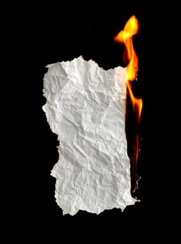 burning paper dark background photo