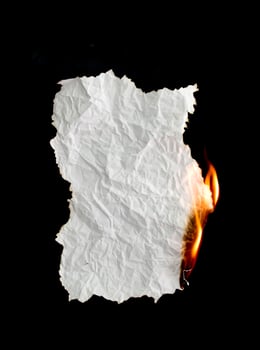 burning paper dark background photo
