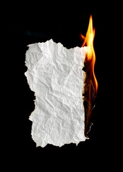 burning paper dark background photo