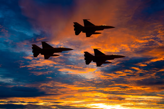 Silhouette airplane with beautiful colorful sunset sky background. photo