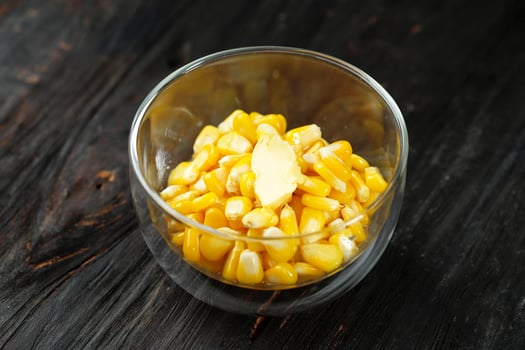 Buttered corn or Sweet corn with butter photo