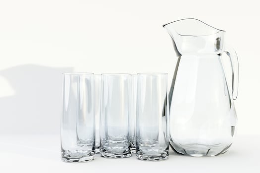 A decanter and a glass for milk, water or juice on a white isolated background. 3d illustration photo