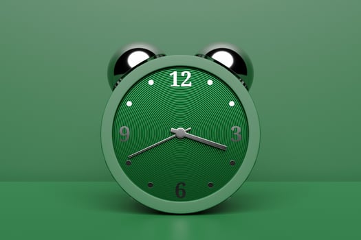 3d illustration green cartoon wake up alarm clock on isolated monochrome background photo