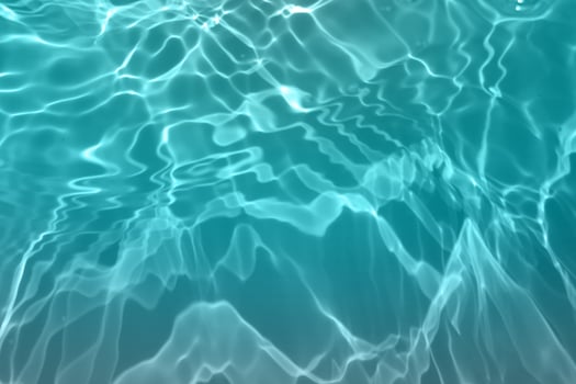 Defocus blurred blue watercolor in swimming pool rippled water detail background. Water splash, water spray background. photo