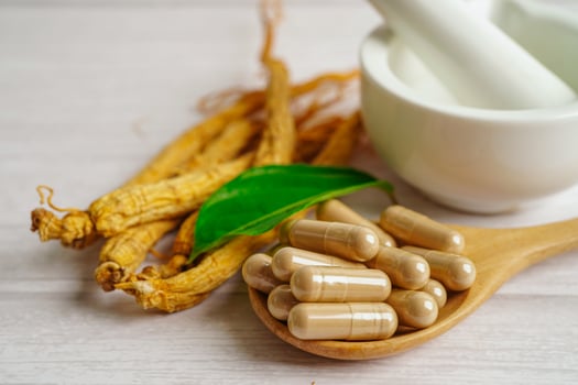 Ginseng roots and green leaf, healthy food. photo