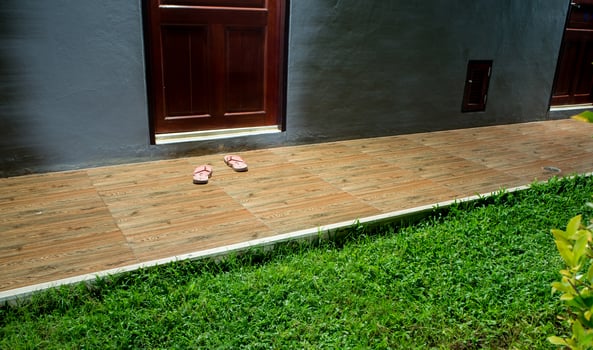 Slipper on the floor in front of the room photo