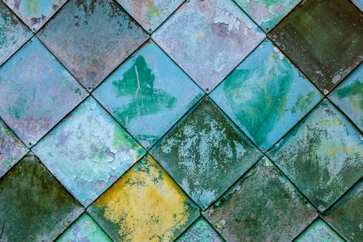 old paint vintage background. Geometrical green rhomb. photo