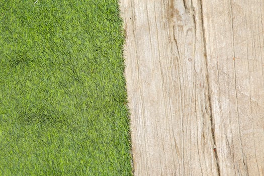 wooden with green grass background photo