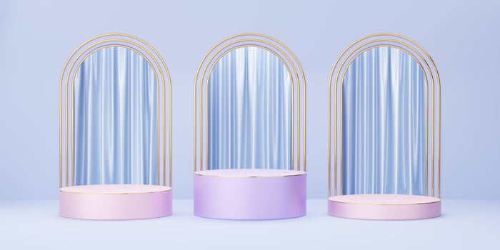 Purple, pink cylinder podium with gold border on blue arch and curtain background. Abstract minimal studio 3d geometric shape object. Mockup space for display of product design. 3d rendering. photo