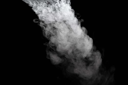 Abstract powder or smoke isolated on black background photo