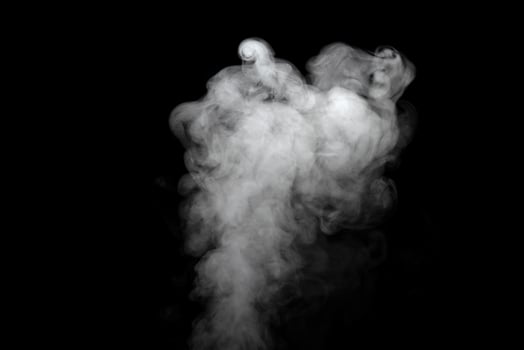 Abstract powder or smoke effect isolated on black background photo