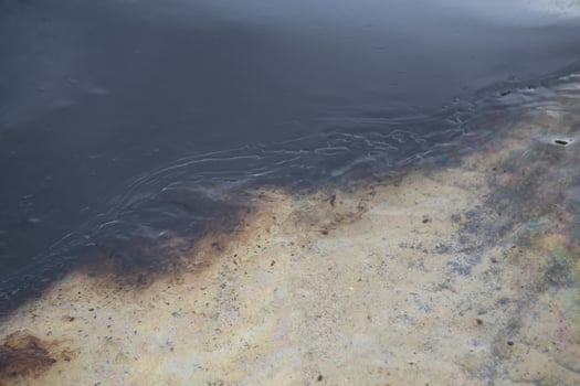 Gulf oil spill is shown on a beach photo