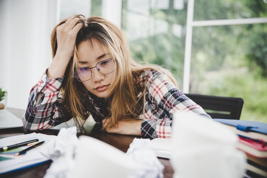 Young frustrated woman working at office photo