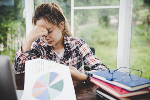 woman stress from work overload photo