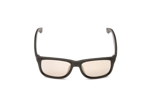 New black sunglasses with brown lens isolated on white photo