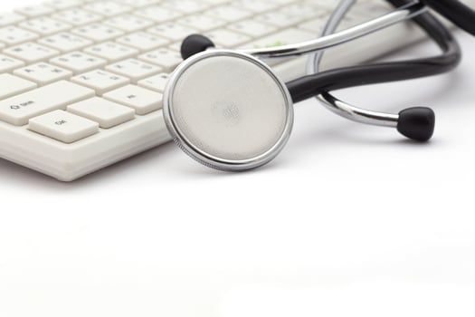 Stethoscope on the keyboard photo