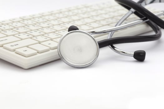 Stethoscope on the keyboard photo
